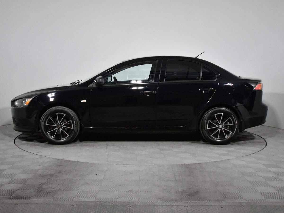 Купить Mitsubishi Lancer с пробегом. Фото: #7