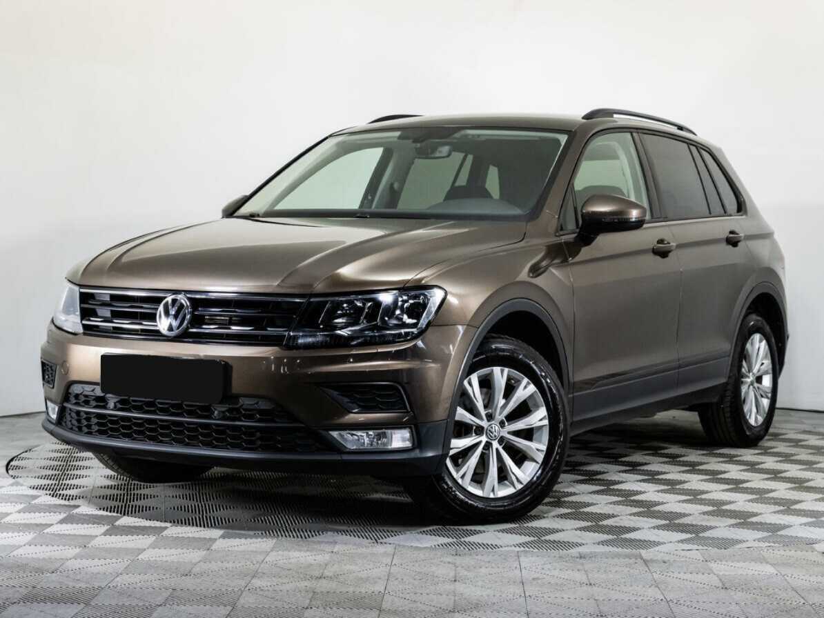 Купить Volkswagen Tiguan с пробегом. Посмотреть фото