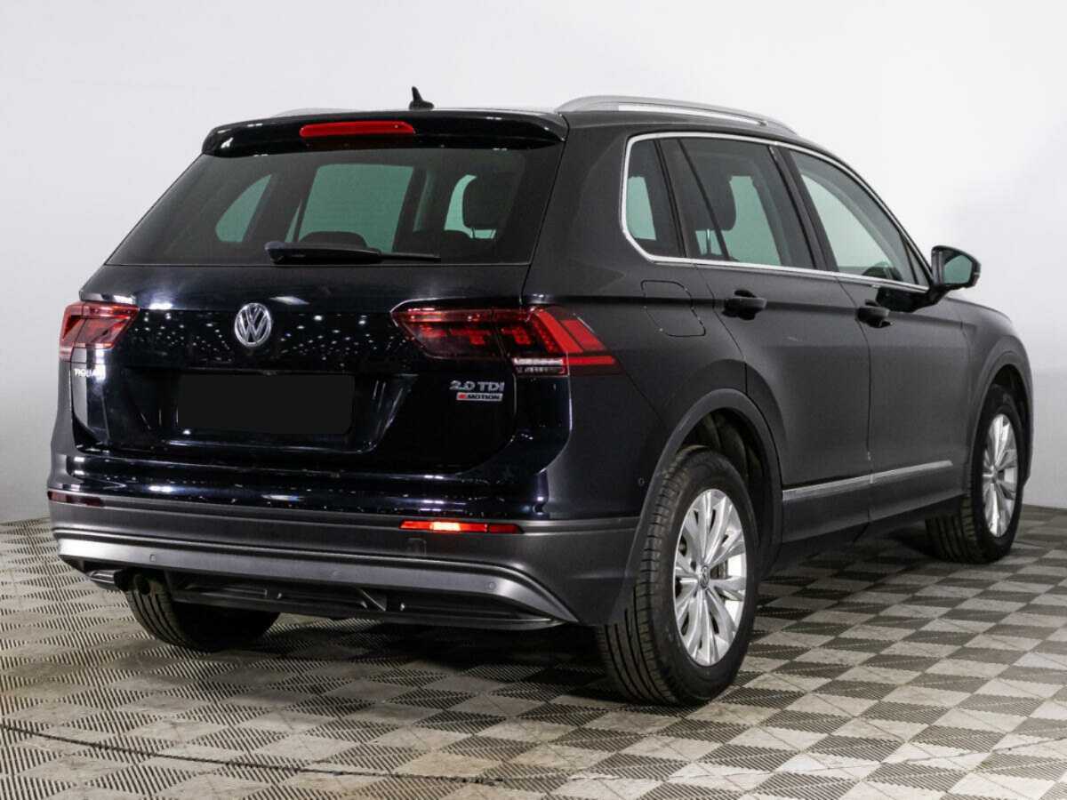 Купить Volkswagen Tiguan с пробегом. Фото: #4