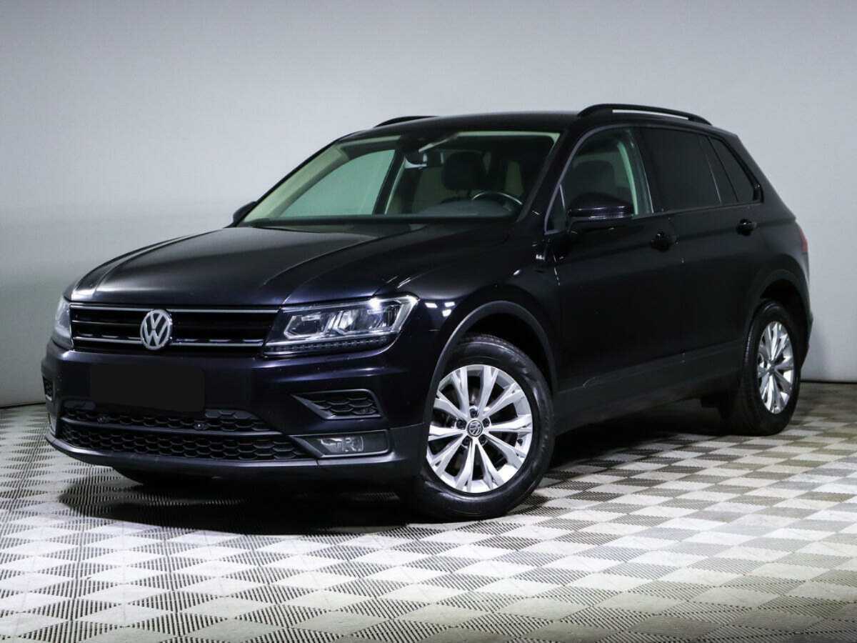 Купить Volkswagen Tiguan с пробегом. Посмотреть фото