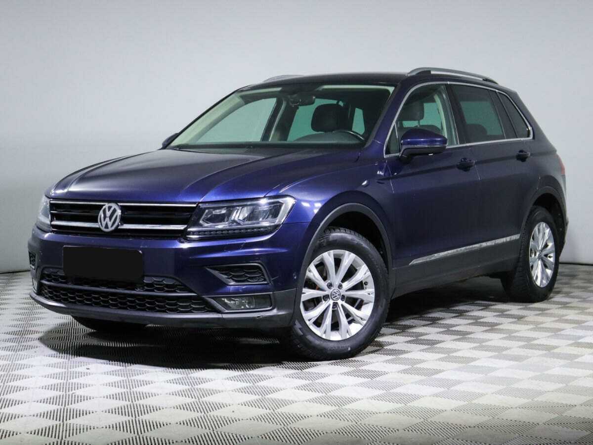 Купить Volkswagen Tiguan с пробегом. Посмотреть фото