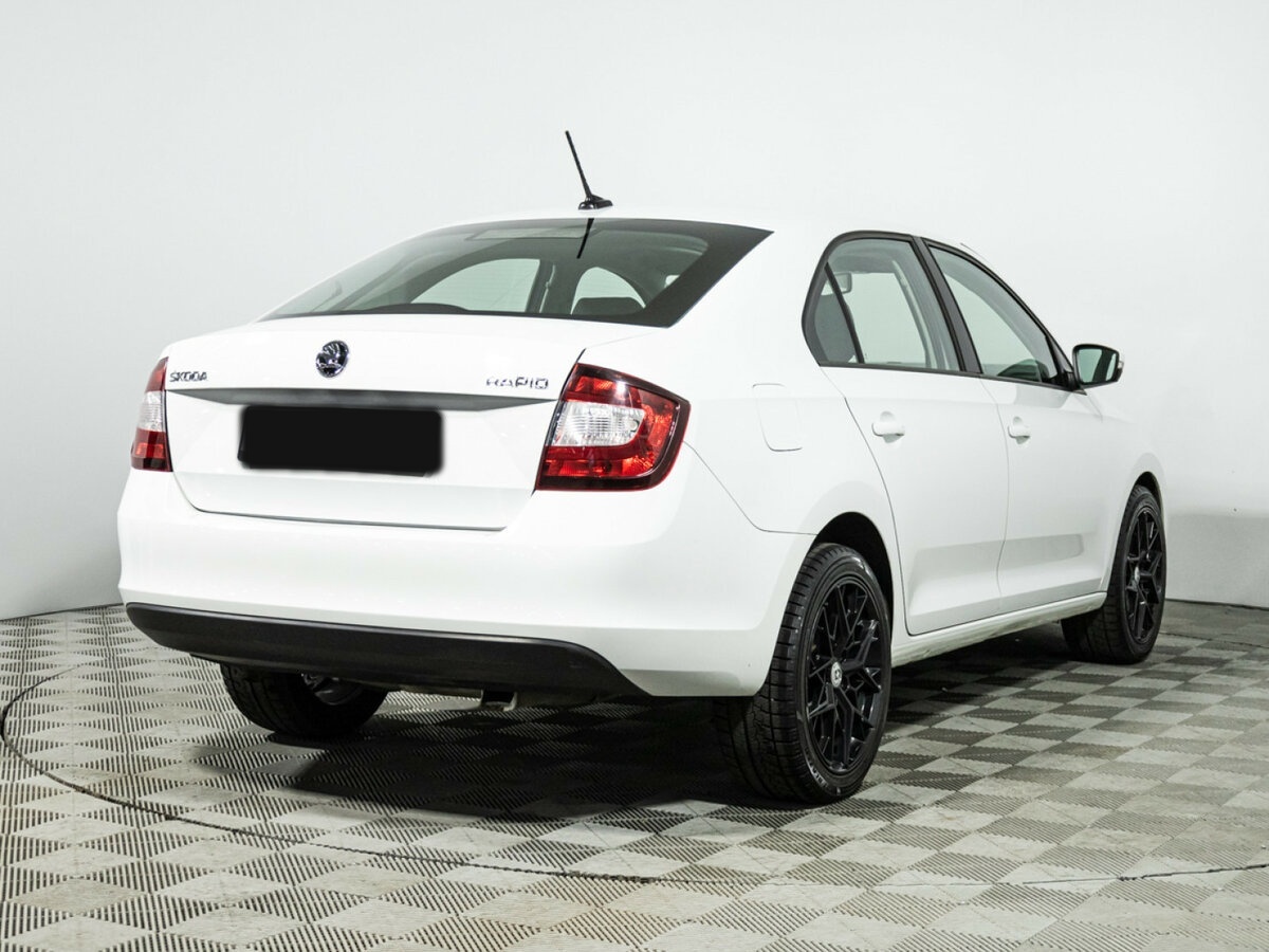 Купить Skoda Rapid с пробегом. Фото: #4