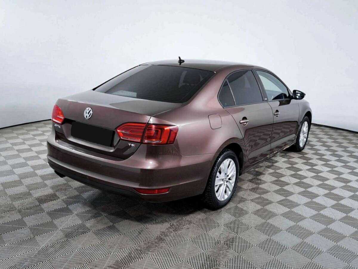 Купить Volkswagen Jetta с пробегом. Фото: #4