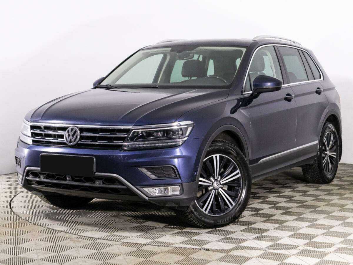 Купить Volkswagen Tiguan с пробегом. Посмотреть фото