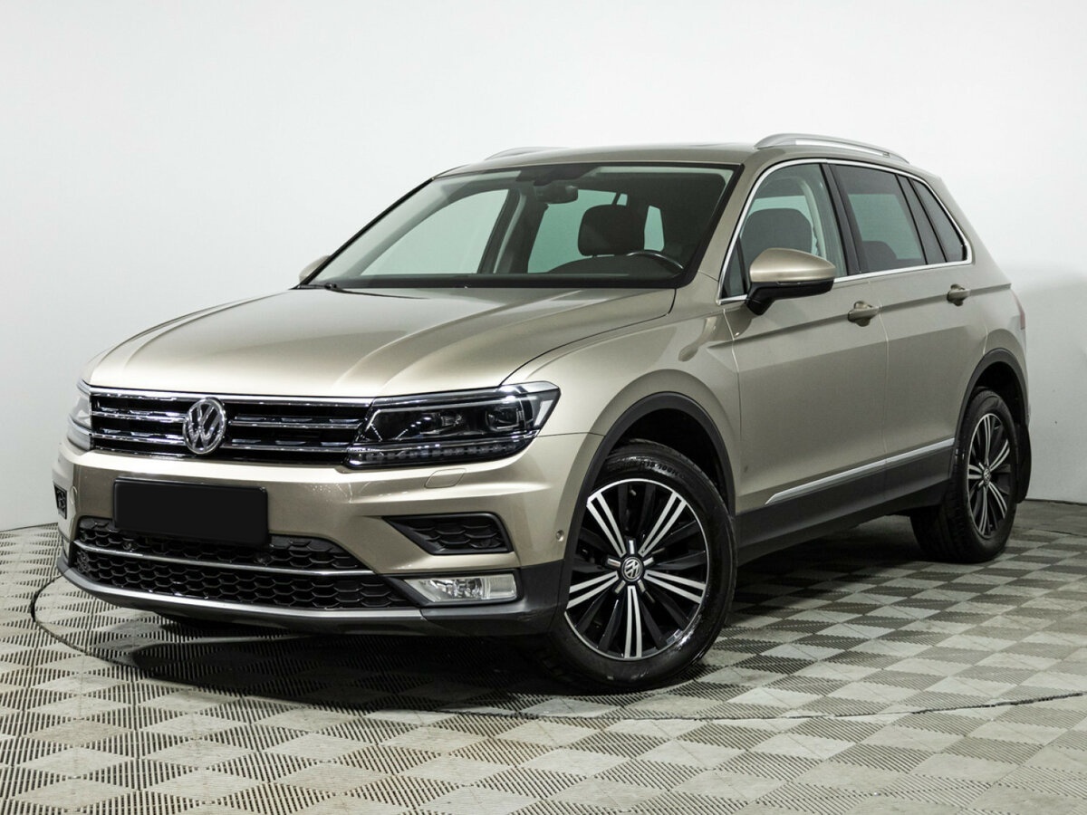Купить Volkswagen Tiguan с пробегом. Посмотреть фото