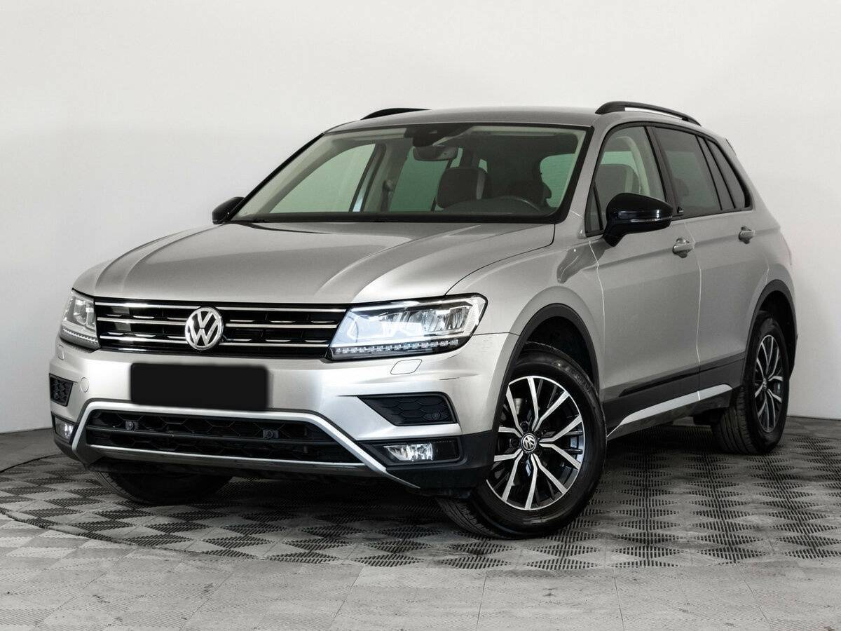 Купить Volkswagen Tiguan с пробегом. Посмотреть фото