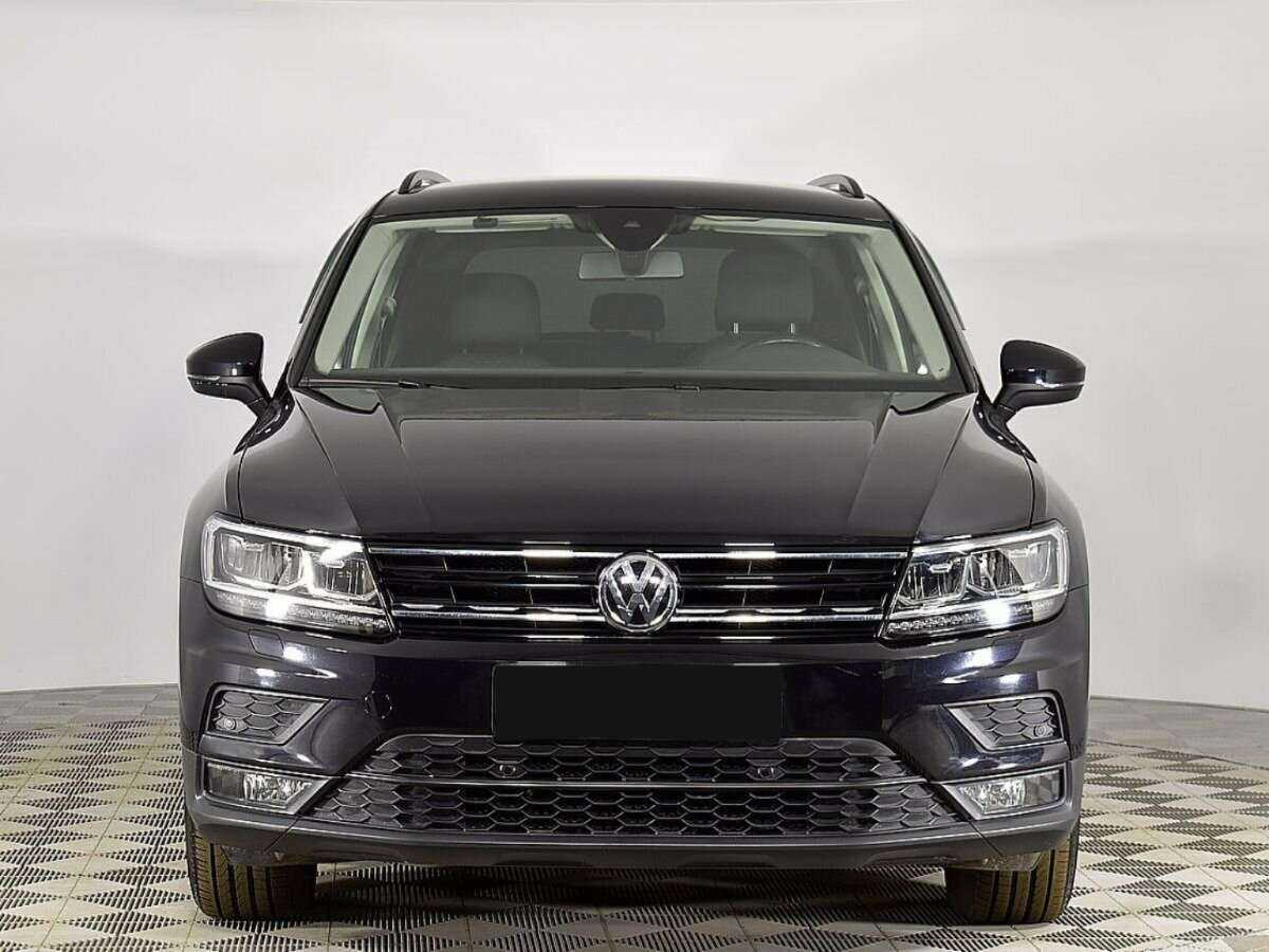Купить Volkswagen Tiguan с пробегом. Посмотреть фото