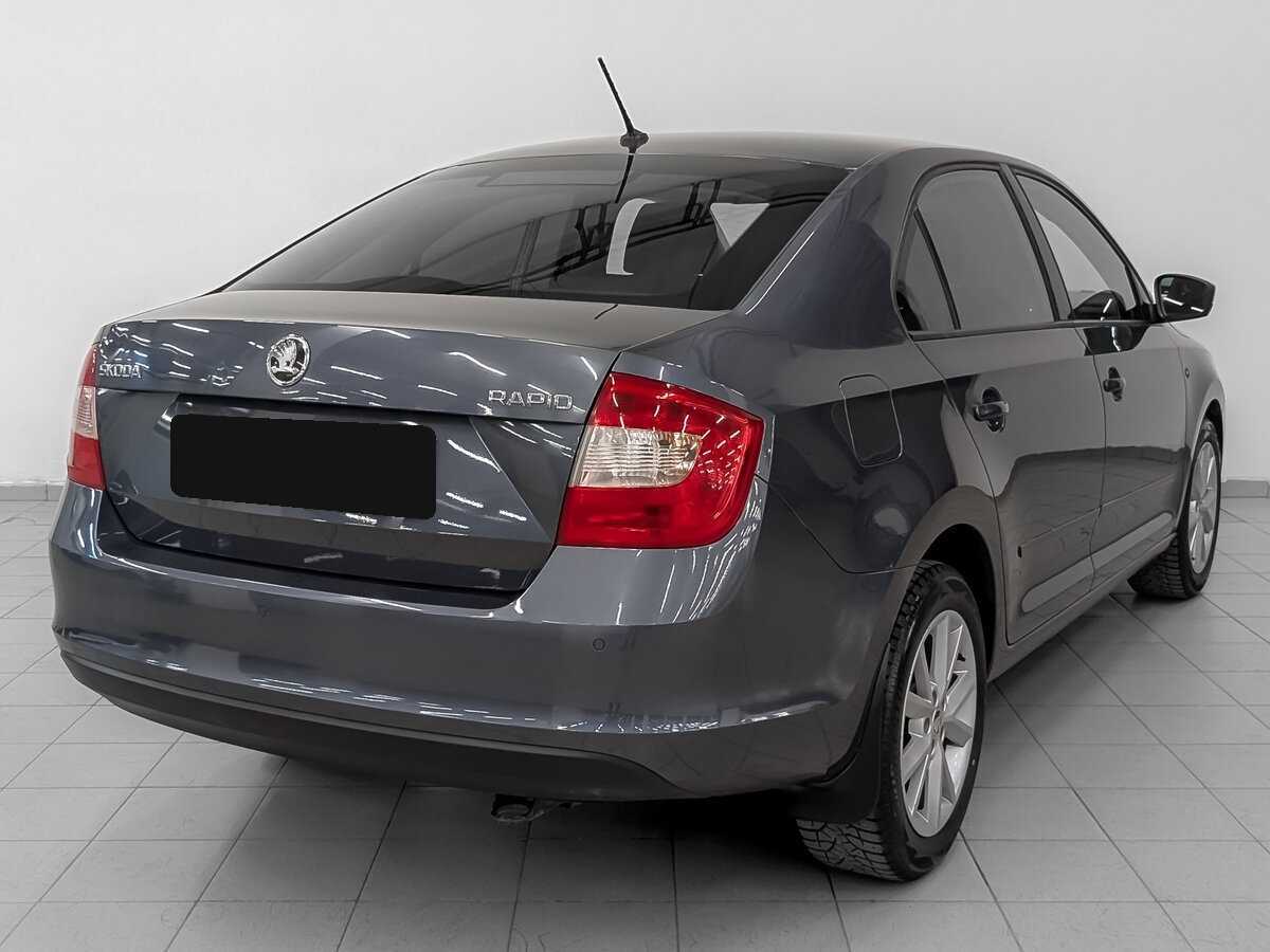 Купить Skoda Rapid с пробегом. Фото: #4