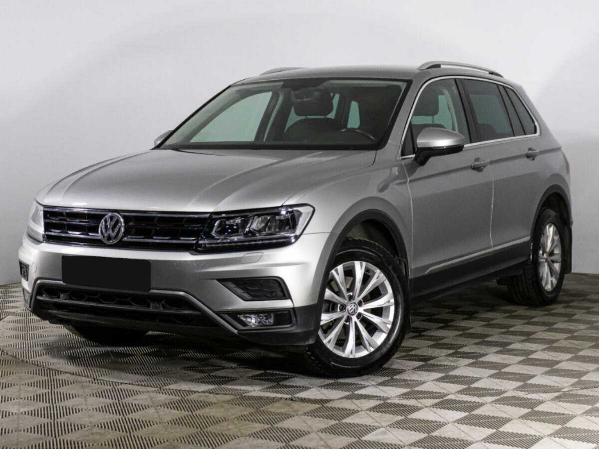 Купить Volkswagen Tiguan с пробегом. Посмотреть фото