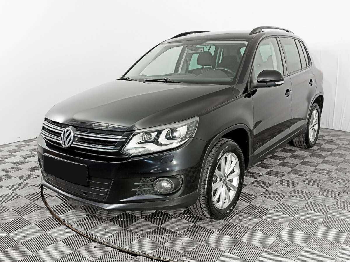 Купить Volkswagen Tiguan с пробегом. Посмотреть фото