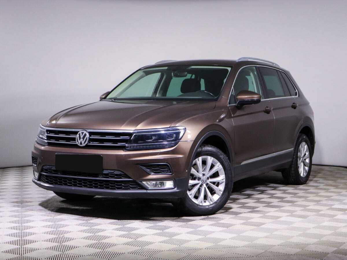 Купить Volkswagen Tiguan с пробегом. Посмотреть фото