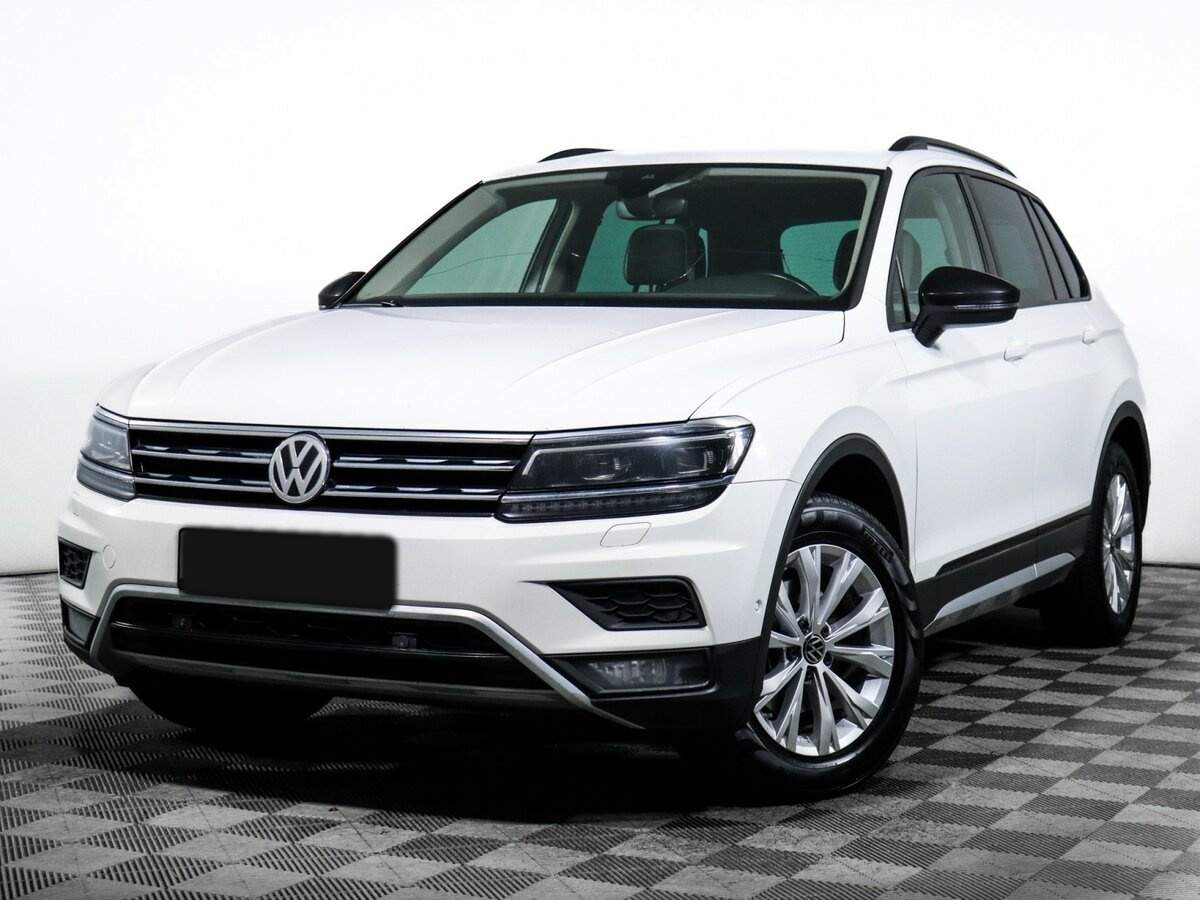 Купить Volkswagen Tiguan с пробегом. Посмотреть фото