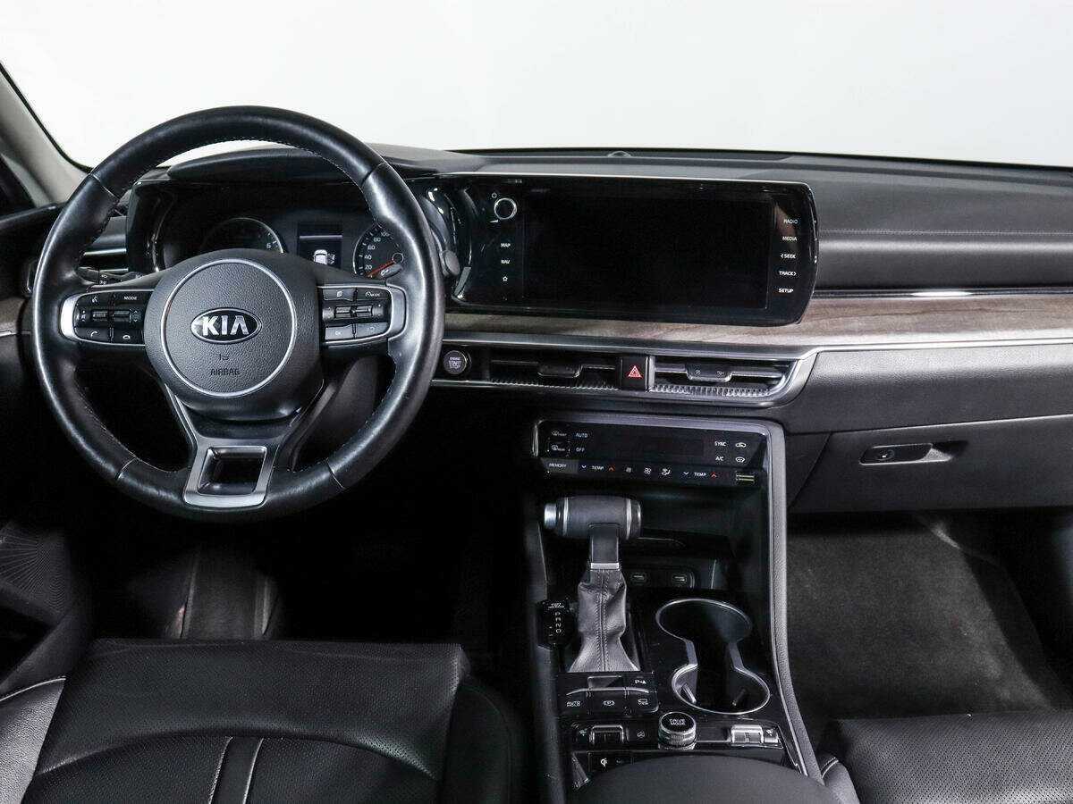 Купить Kia K5 с пробегом. Фото: #9