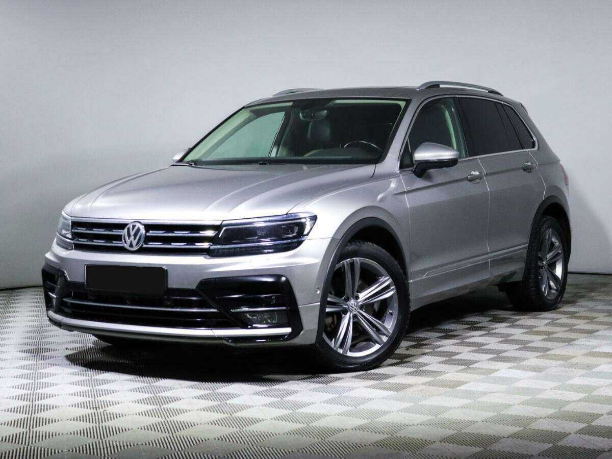 Купить Volkswagen Tiguan с пробегом. Посмотреть фото