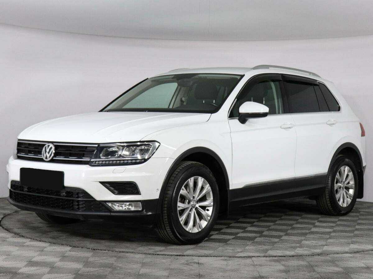 Купить Volkswagen Tiguan с пробегом. Посмотреть фото