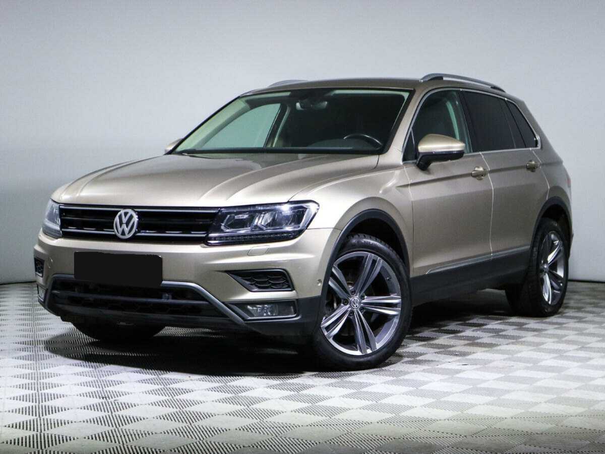 Купить Volkswagen Tiguan с пробегом. Посмотреть фото