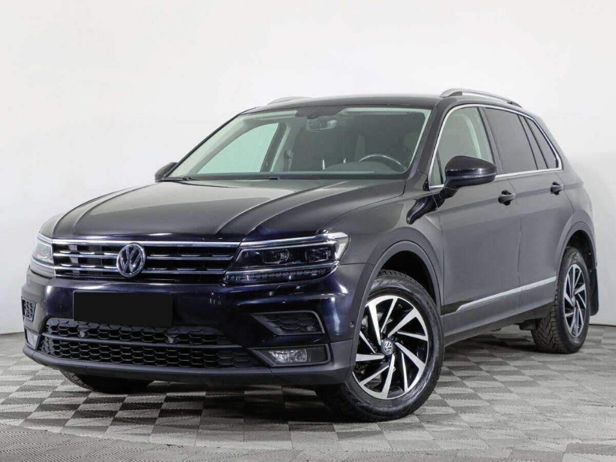 Купить Volkswagen Tiguan с пробегом. Посмотреть фото