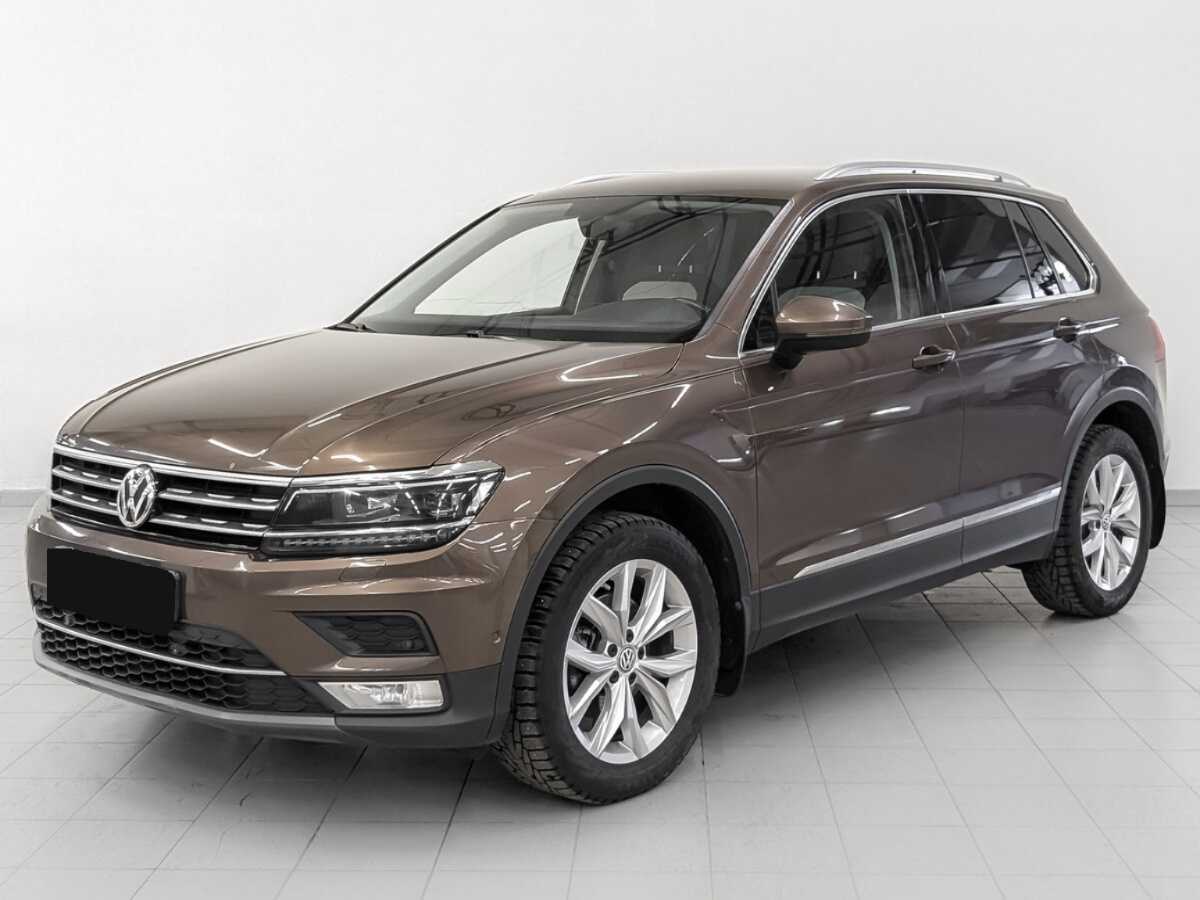 Купить Volkswagen Tiguan с пробегом. Посмотреть фото