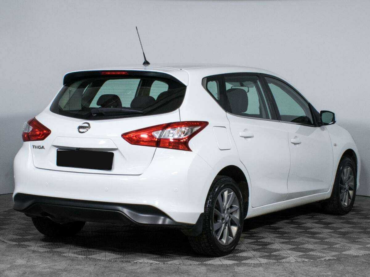 Купить Nissan Tiida с пробегом. Фото: #4