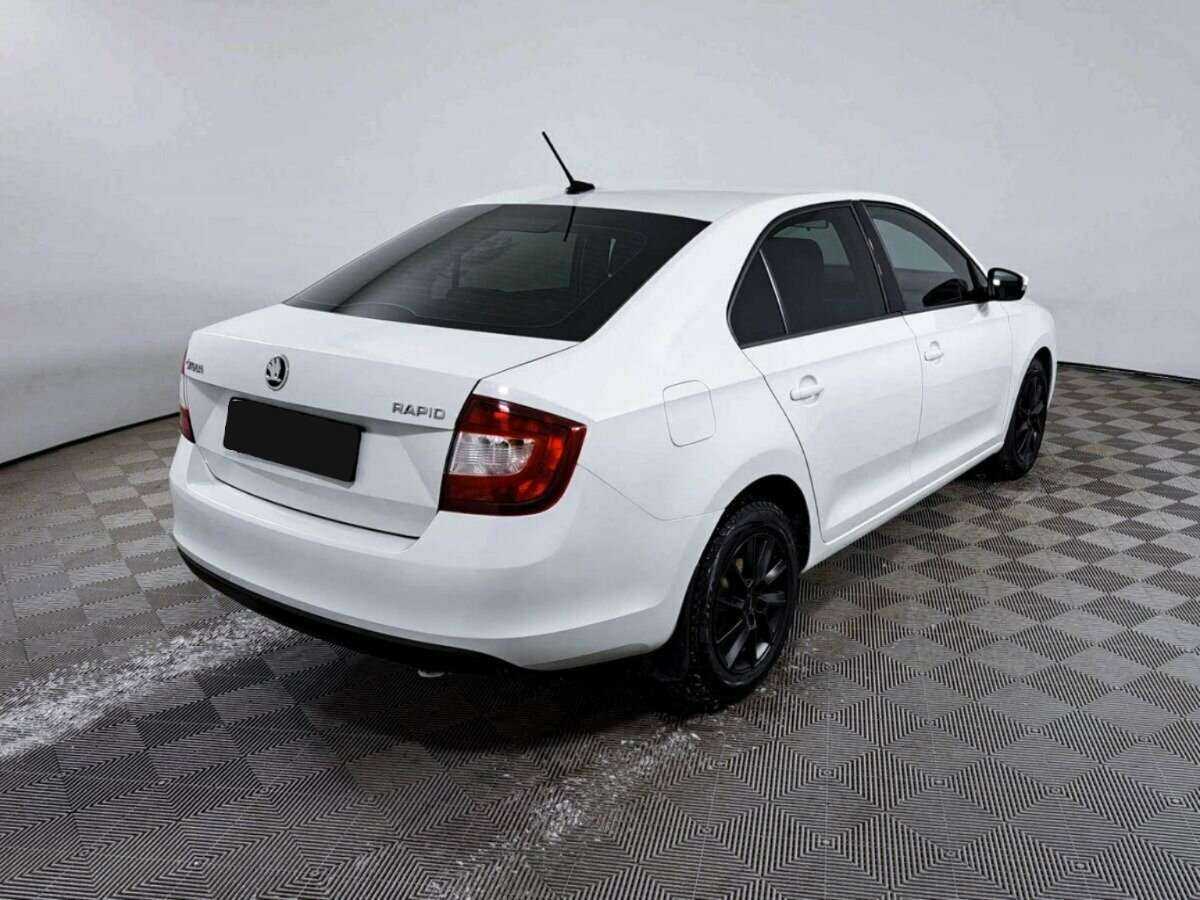 Купить Skoda Rapid с пробегом. Фото: #4