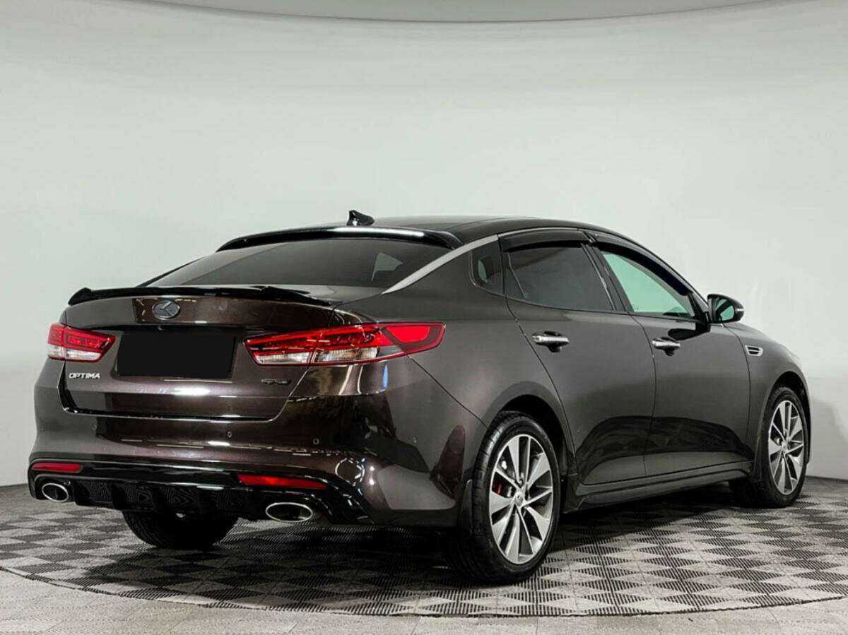 Купить Kia Optima с пробегом. Фото: #4