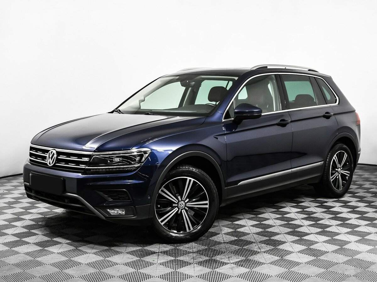 Купить Volkswagen Tiguan с пробегом. Посмотреть фото