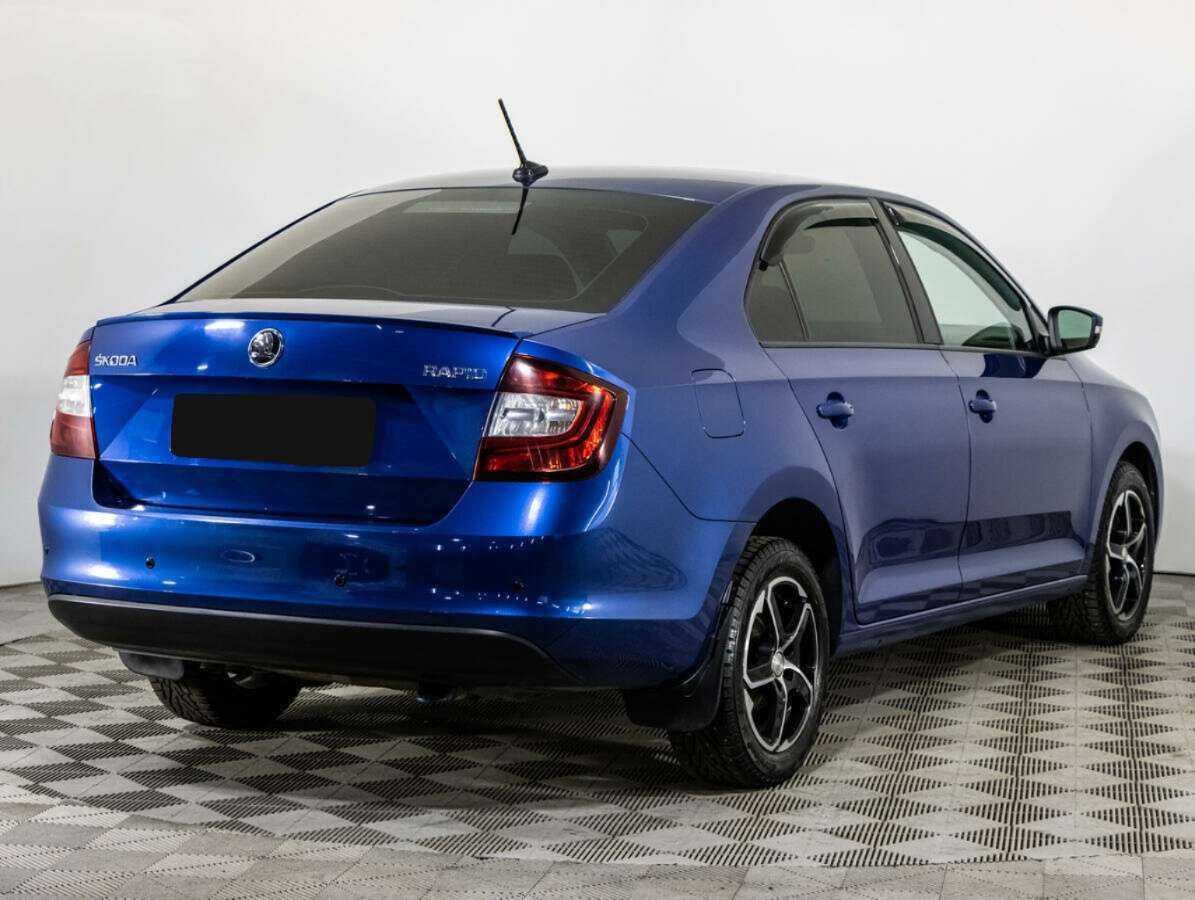 Купить Skoda Rapid с пробегом. Фото: #4