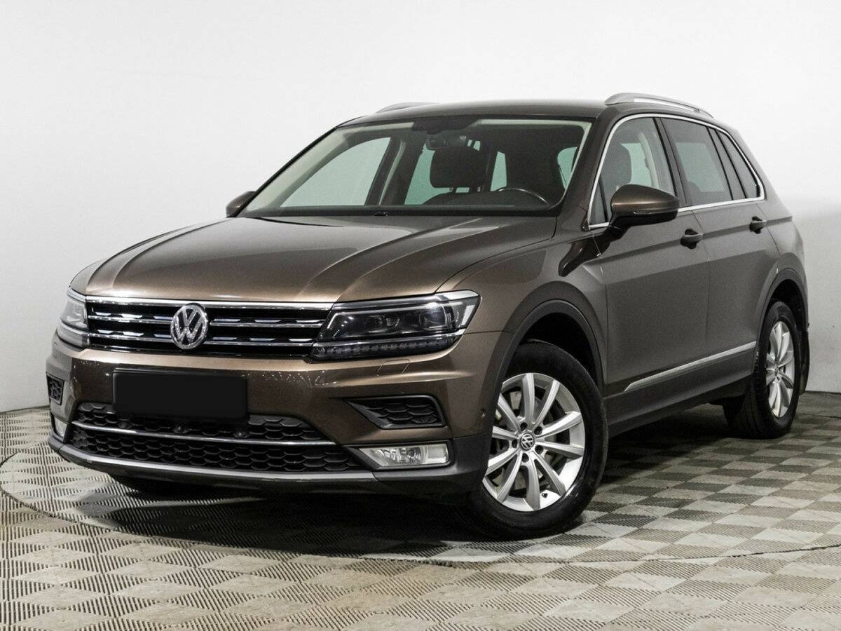 Купить Volkswagen Tiguan с пробегом. Посмотреть фото