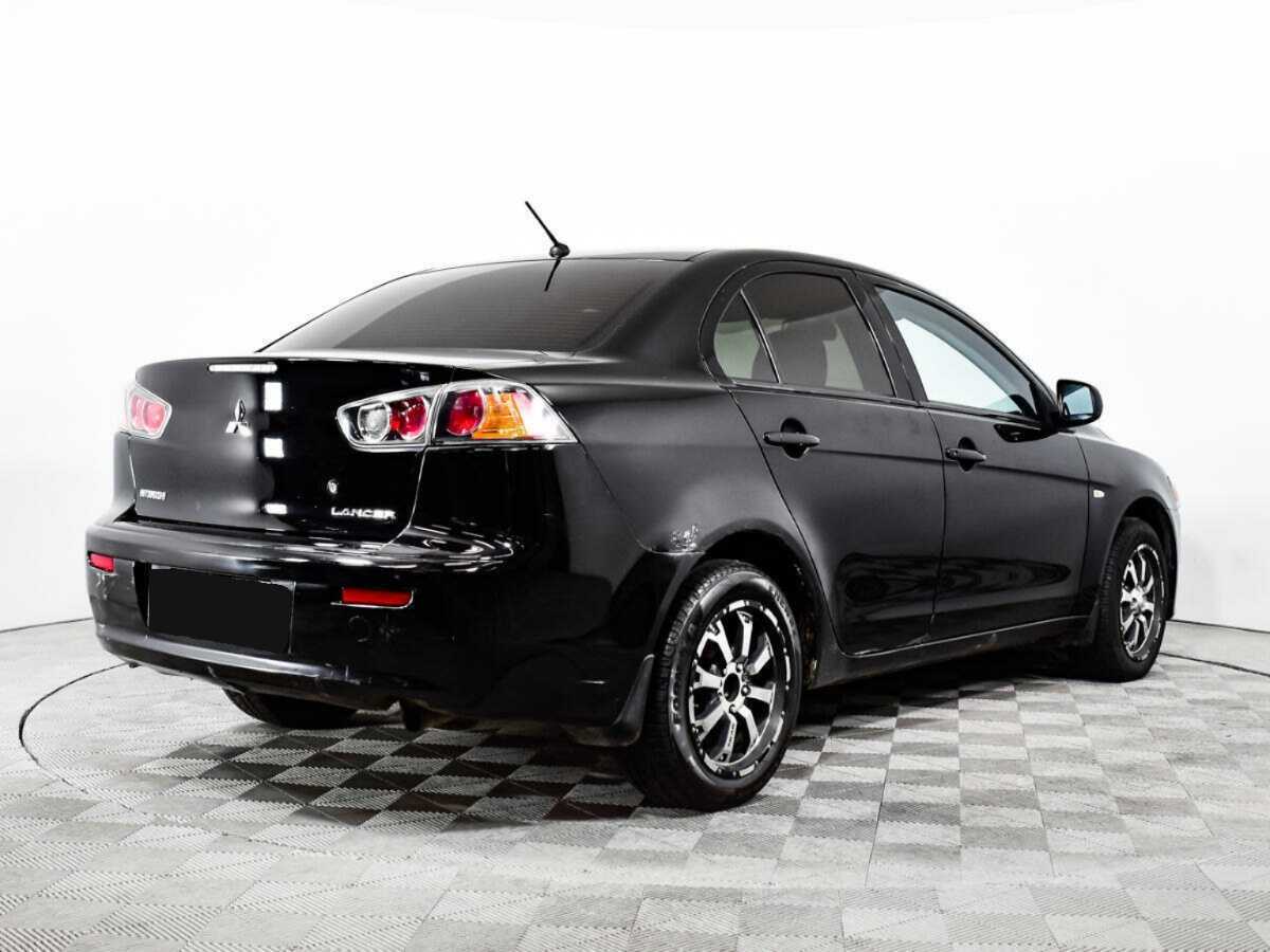 Купить Mitsubishi Lancer с пробегом. Фото: #4