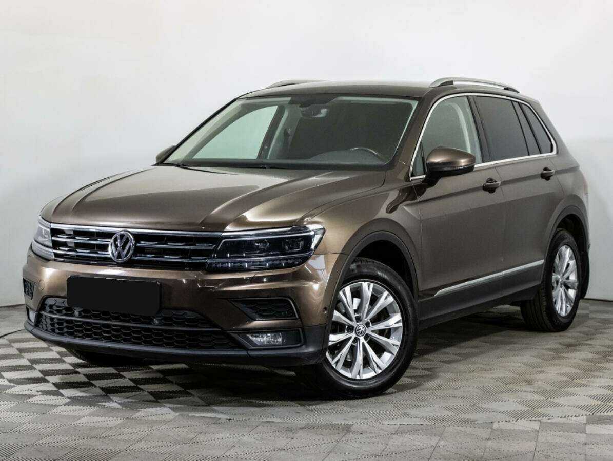 Купить Volkswagen Tiguan с пробегом. Посмотреть фото