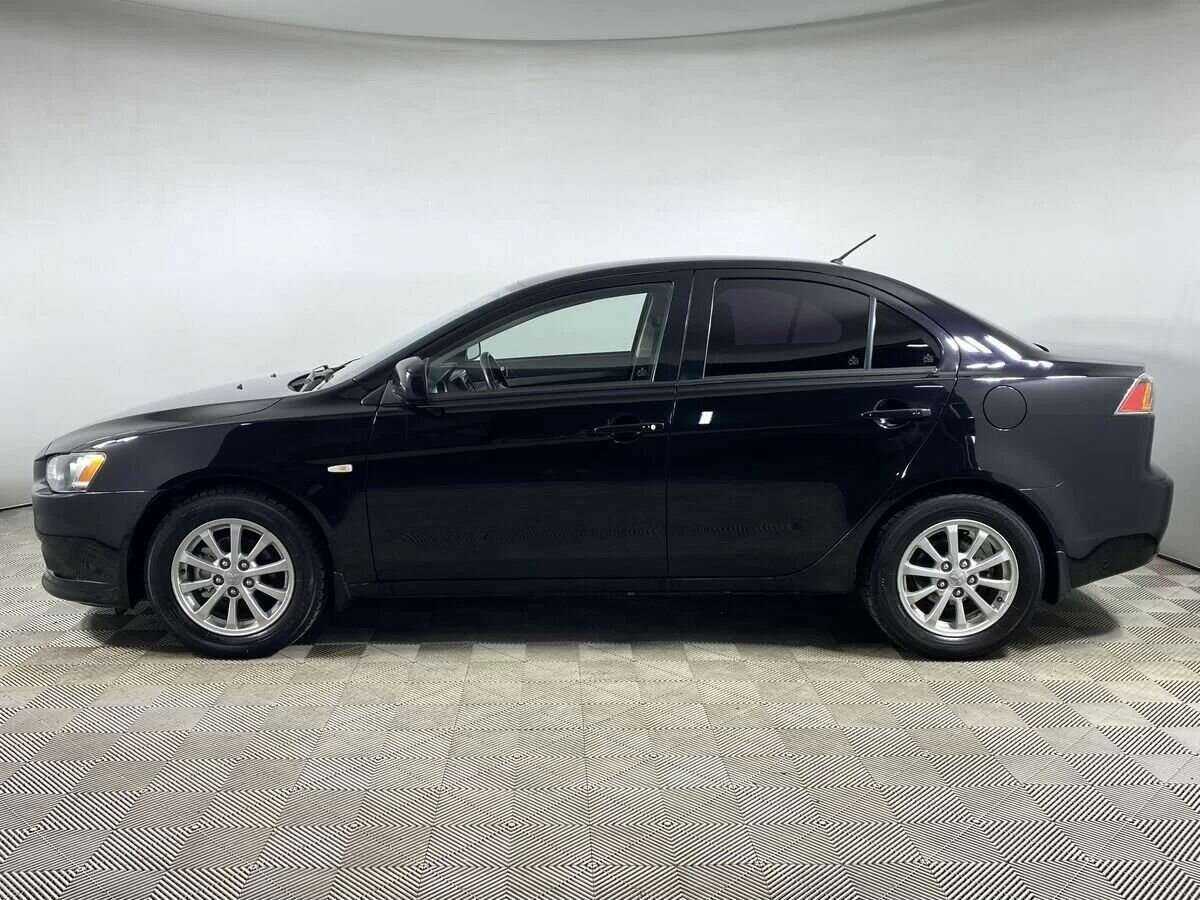 Купить Mitsubishi Lancer с пробегом. Фото: #4