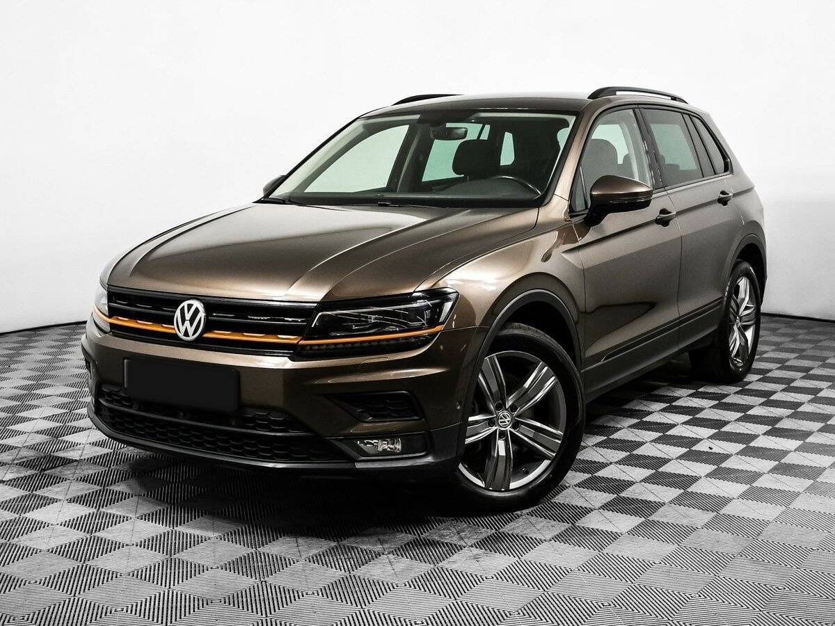 Купить Volkswagen Tiguan с пробегом. Посмотреть фото
