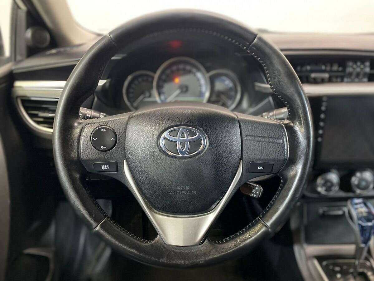 Купить Toyota Corolla с пробегом. Фото: #11
