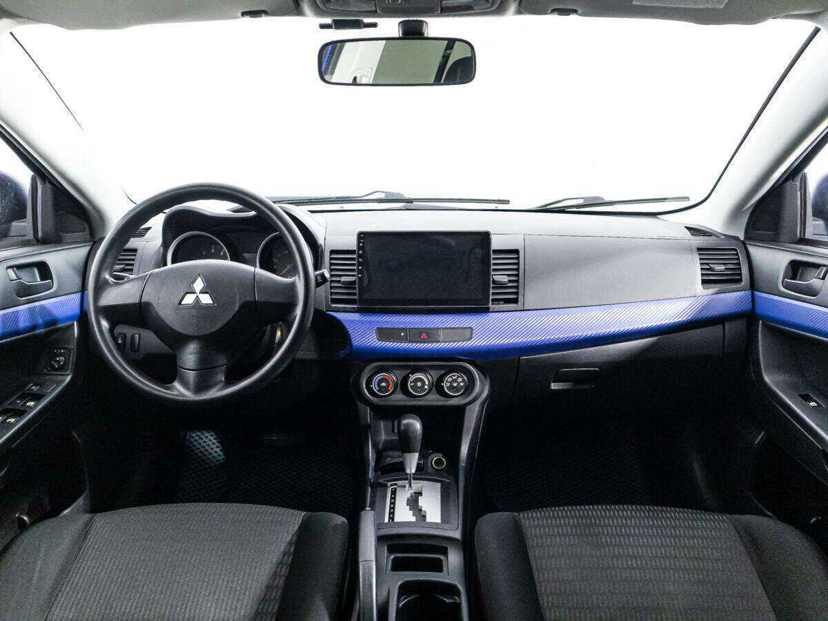 Купить Mitsubishi Lancer с пробегом. Фото: #12