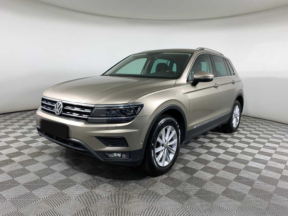 Купить Volkswagen Tiguan с пробегом. Посмотреть фото