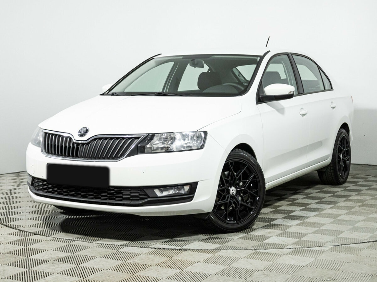 Купить Skoda Rapid с пробегом. Посмотреть фото