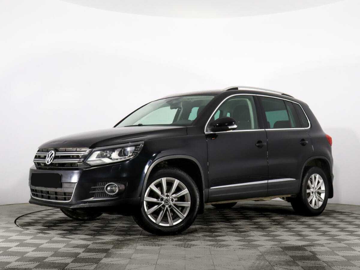 Купить Volkswagen Tiguan с пробегом. Посмотреть фото