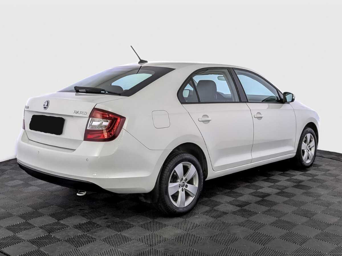 Купить Skoda Rapid с пробегом. Фото: #4
