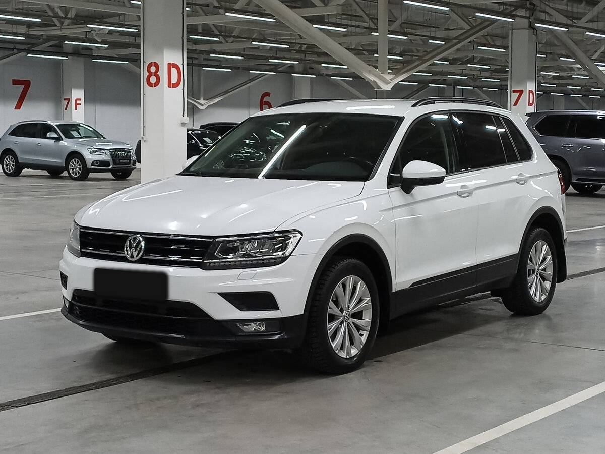 Купить Volkswagen Tiguan с пробегом. Посмотреть фото