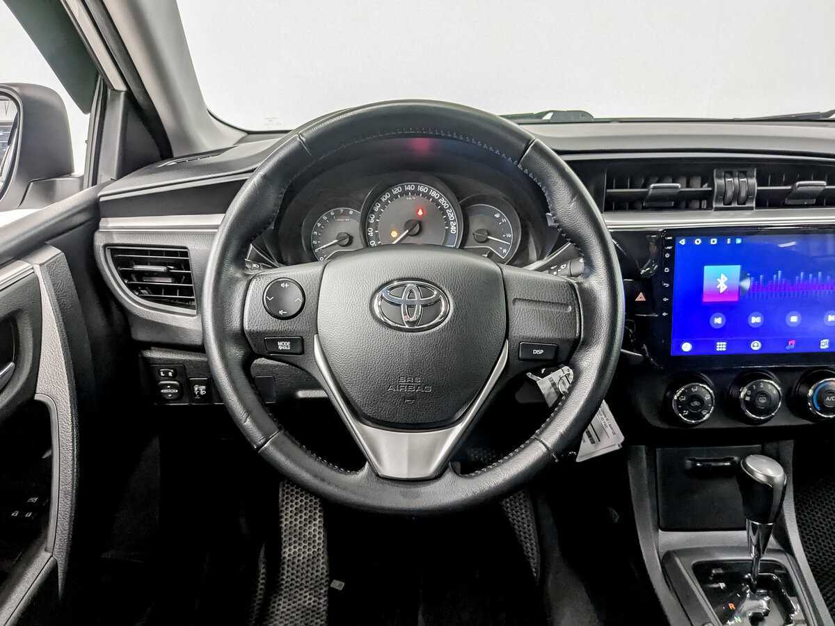Купить Toyota Corolla с пробегом. Фото: #20
