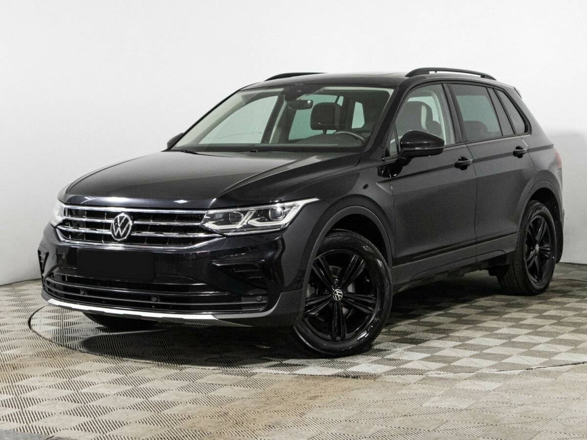 Купить Volkswagen Tiguan с пробегом. Посмотреть фото