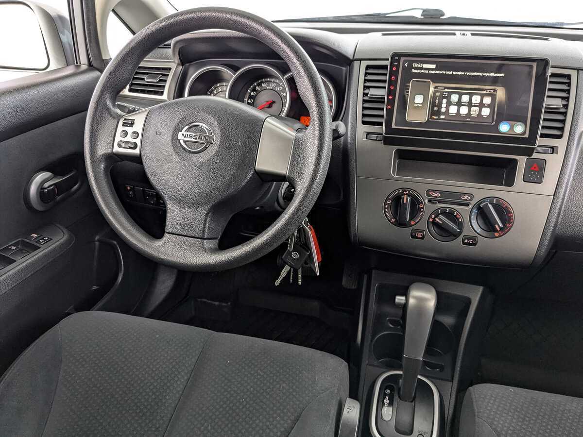 Купить Nissan Tiida с пробегом. Фото: #20