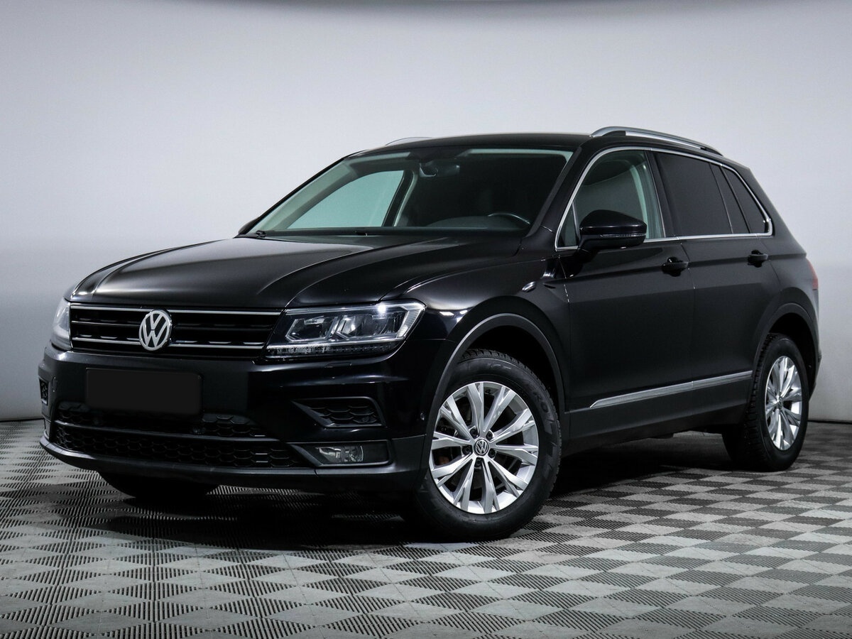 Купить Volkswagen Tiguan с пробегом. Посмотреть фото