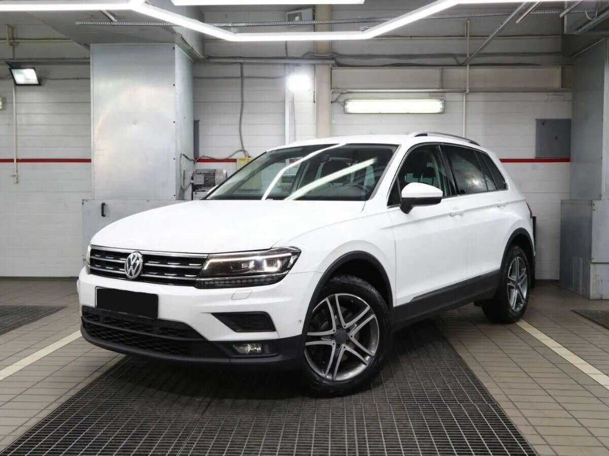 Купить Volkswagen Tiguan с пробегом. Посмотреть фото