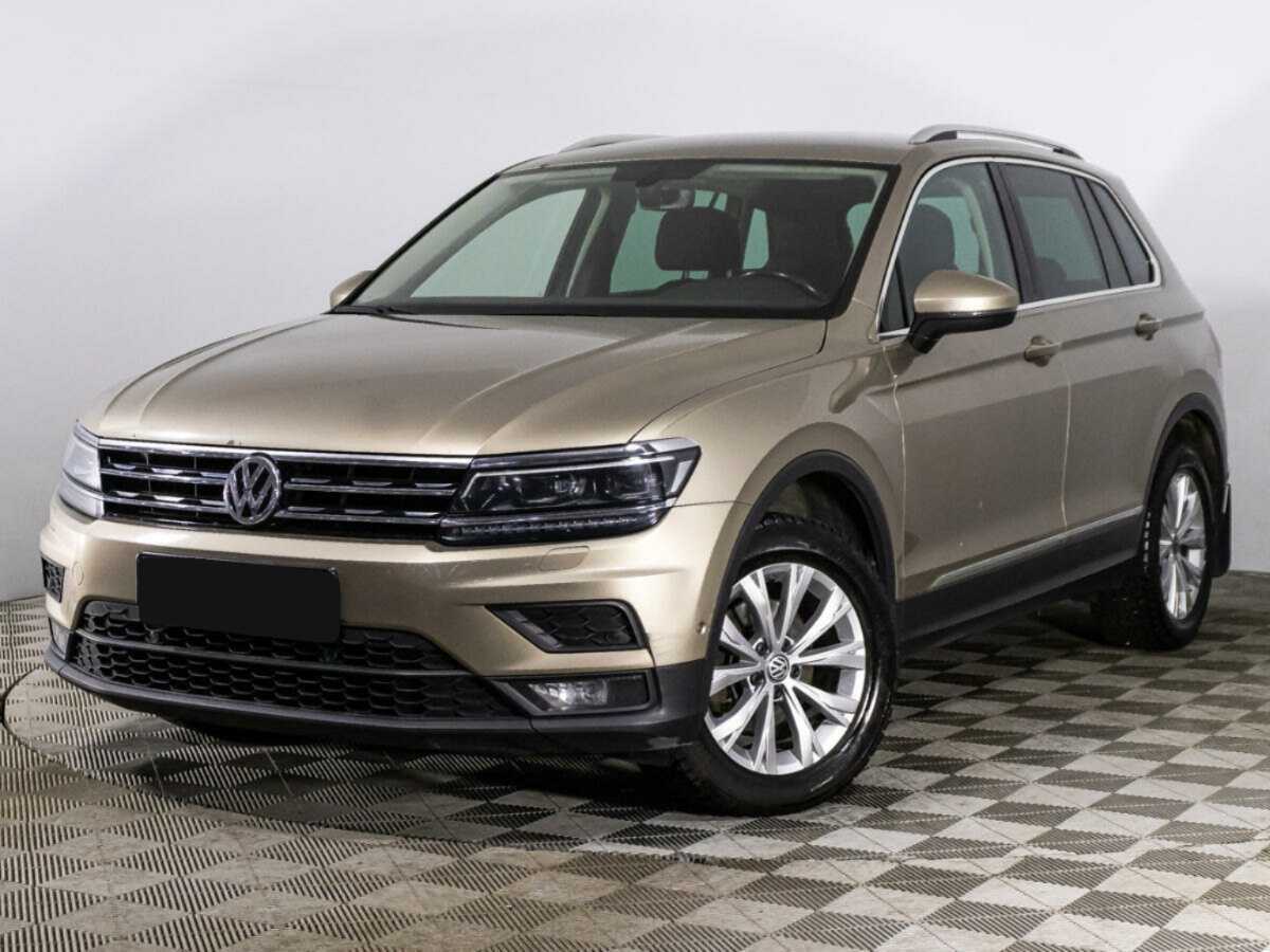 Купить Volkswagen Tiguan с пробегом. Посмотреть фото