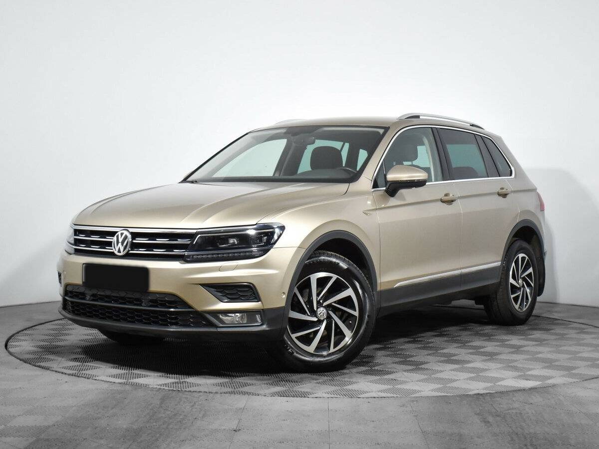 Купить Volkswagen Tiguan с пробегом. Посмотреть фото