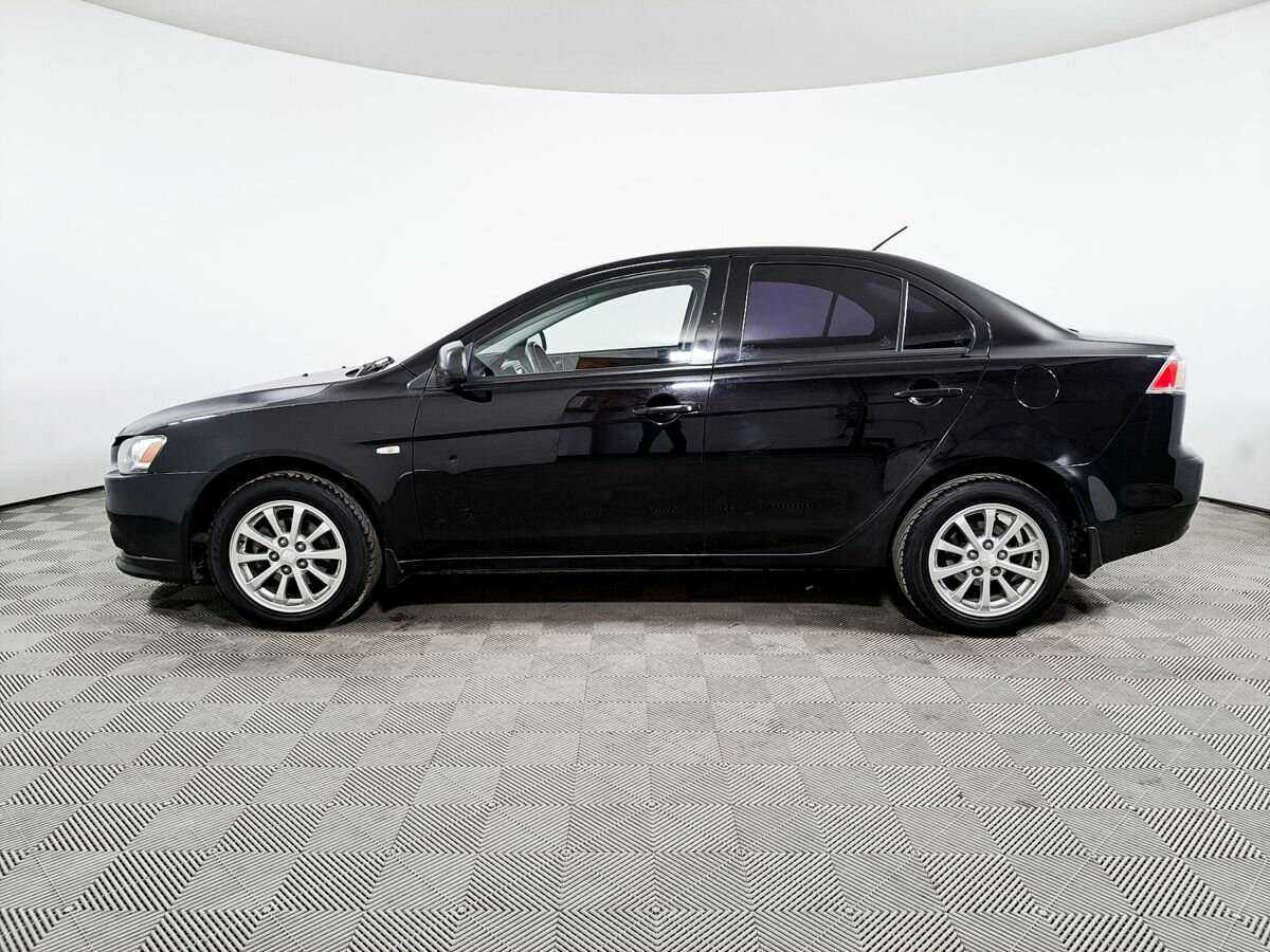 Купить Mitsubishi Lancer с пробегом. Фото: #7