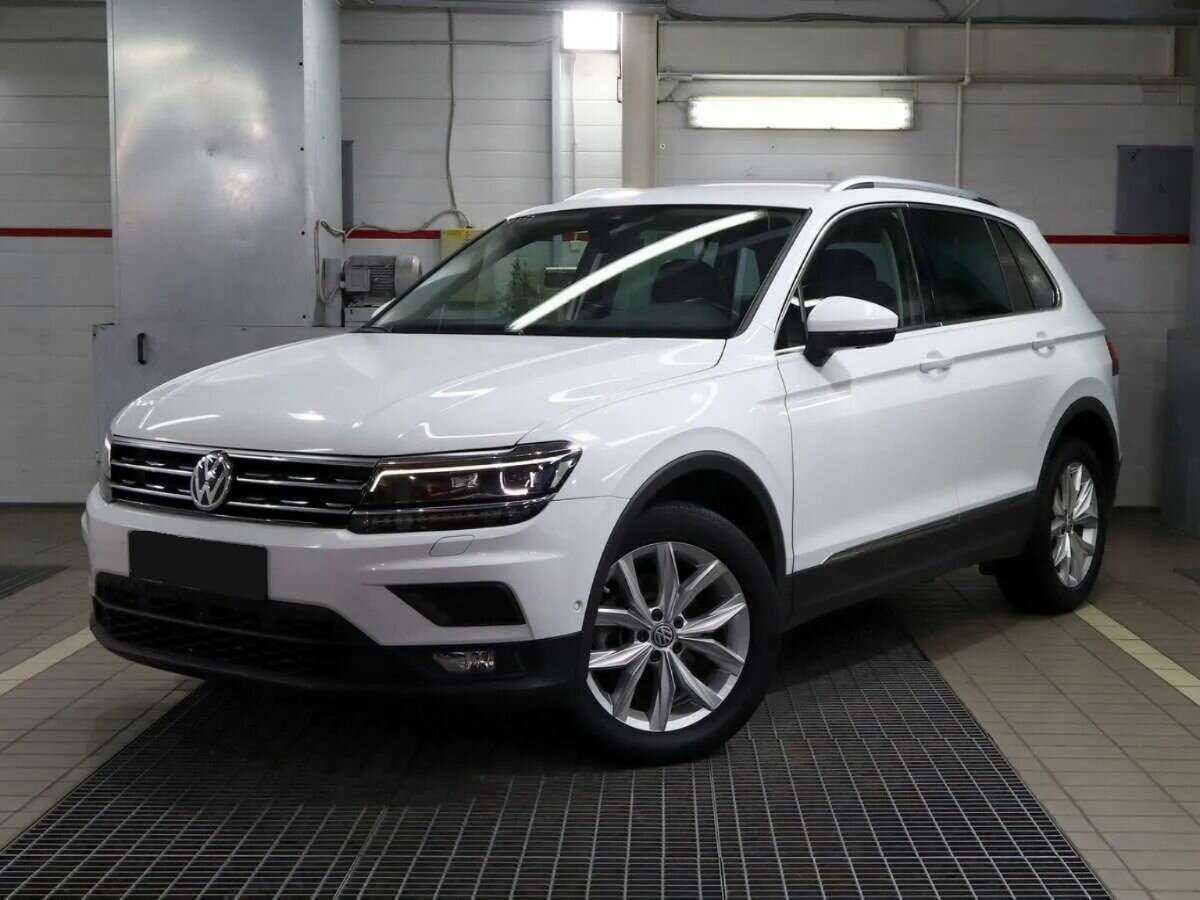 Купить Volkswagen Tiguan с пробегом. Посмотреть фото