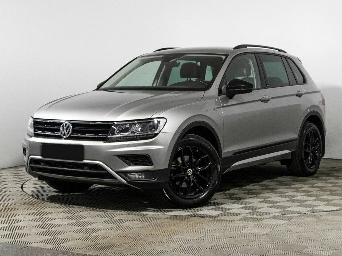 Купить Volkswagen Tiguan с пробегом. Посмотреть фото