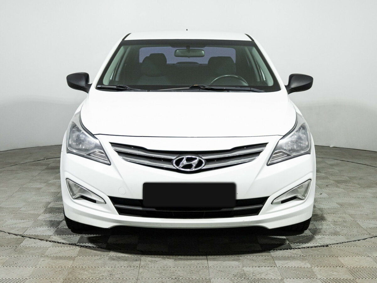 Купить Hyundai Solaris с пробегом. Фото: #1